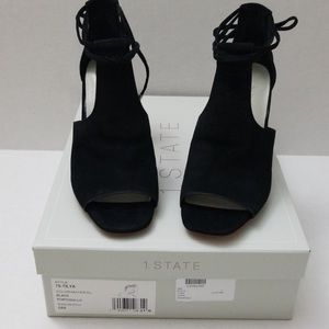 1. State black suede heels with tie closure. Sz 6